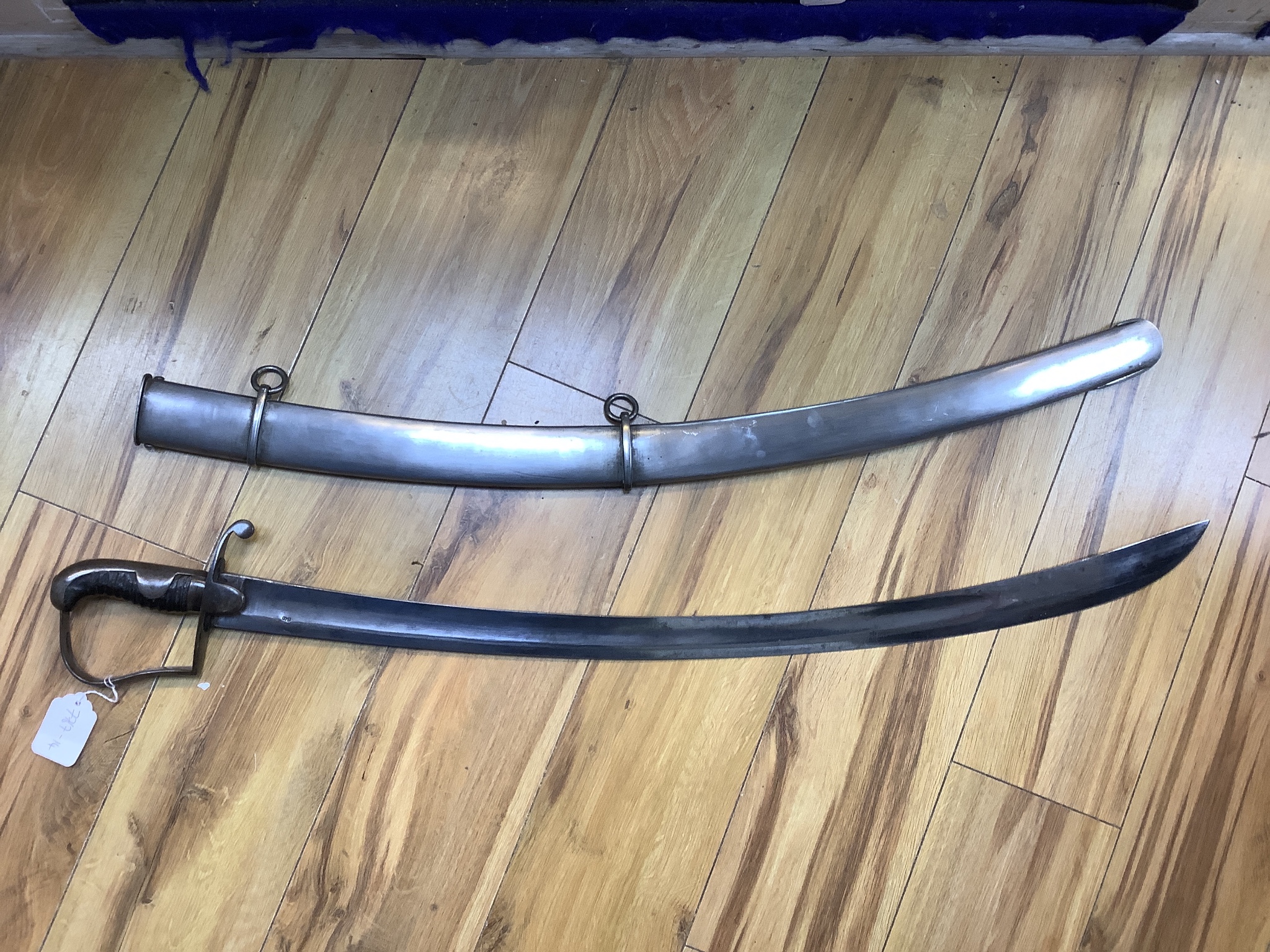 A British pattern 1796 light cavalry sabre, ‘W.S.R.’ engraved to hilt and ‘Bats’? to spine, with steel scabbard. 99cm total length
